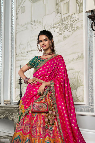 Dark Pink & Green Banarasi Silk Lehenga with Zarkan Codding Work