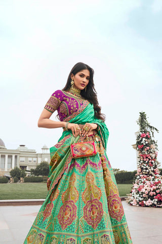 Green and Pink Banarasi Silk Lehenga with Zarkan Codding Work