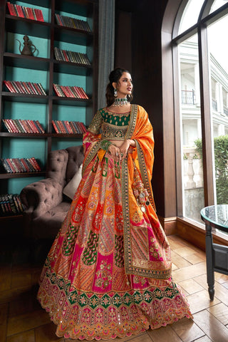 Orange & Green Banarasi Silk Lehenga with Zarkan Codding Work