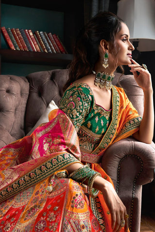 Orange & Green Banarasi Silk Lehenga with Zarkan Codding Work