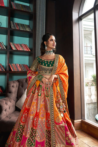 Orange & Green Banarasi Silk Lehenga with Zarkan Codding Work