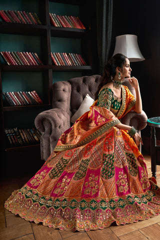 Orange & Green Banarasi Silk Lehenga with Zarkan Codding Work