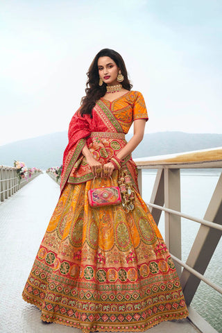 Radiant Yellow and Orange Banarasi Silk Festive Lehenga with Zarkan Detailing