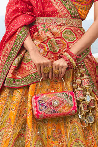 Radiant Yellow and Orange Banarasi Silk Festive Lehenga with Zarkan Detailing